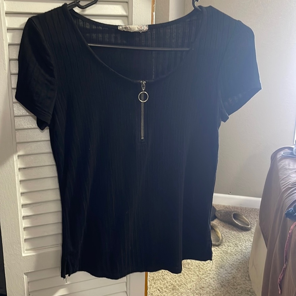 Black tshirt with silver zipper. Stretchy and comfy. Pink Republic size small